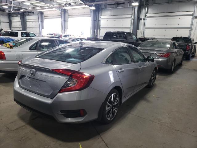Photo 4 from auction – 2016 HONDA CIVIC EXL with VIN 2HGFC1F76GH654780