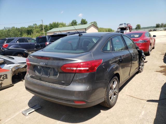 Photo 4 from auction – 2018 FORD FOCUS SE with VIN 1FADP3F22JL209009