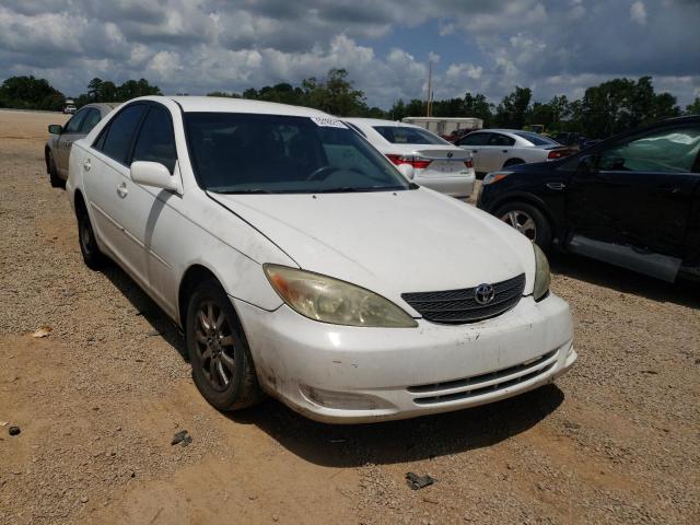 TOYOTA CAMRY LE 2004 with VIN 4T1BE32K74U319402 - Photo from auction