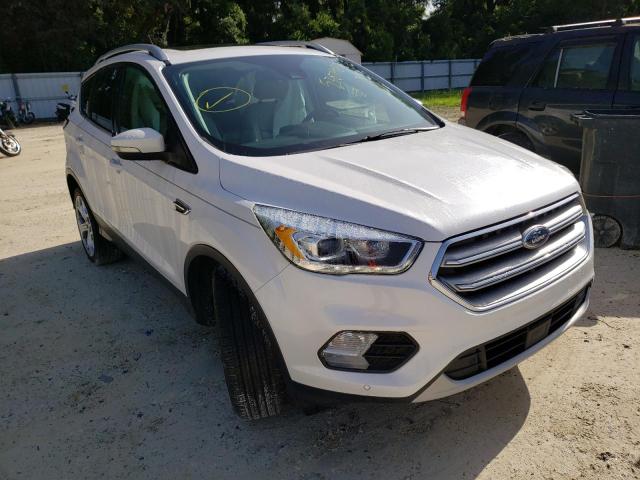FORD ESCAPE TIT 2017 with VIN 1FMCU0J9XHUE30584 - Photo from auction