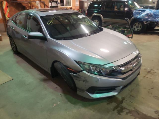 HONDA CIVIC EX 2017 with VIN 19XFC2F70HE067962 - Photo from auction