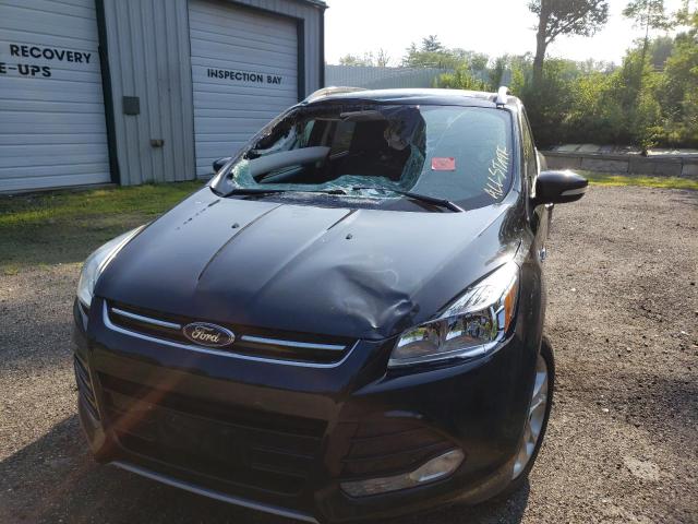 Photo 9 from auction – 2014 FORD ESCAPE TIT with VIN 1FMCU9J9XEUD26337