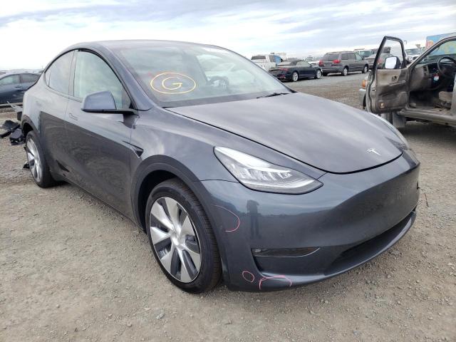 TESLA MODEL Y 2022 with VIN 7SAYGDEE8NF327896 - Photo from auction