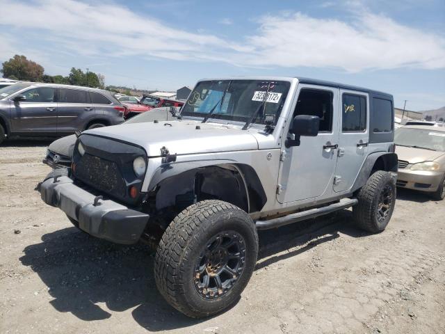 Photo 2 from auction – 2011 JEEP WRANGLER U with VIN 1J4BA3H10BL582326