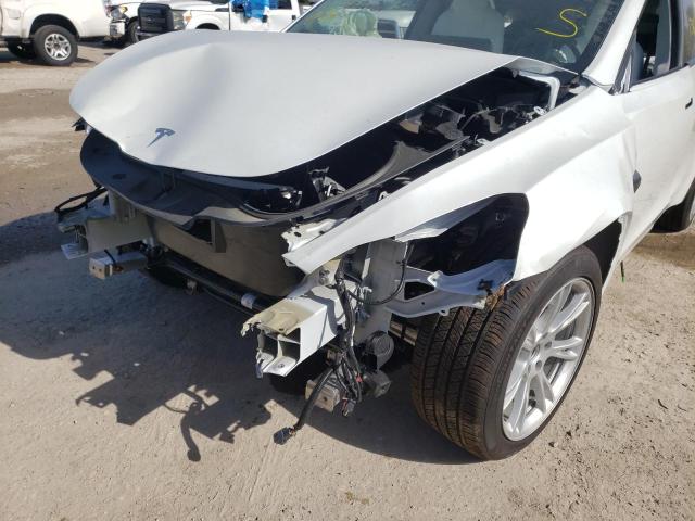 Photo 9 from auction – 2021 TESLA MODEL Y with VIN 5YJYGDEE9MF258342
