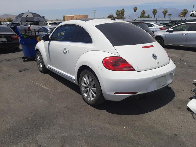 Photo 3 from auction – 2014 VOLKSWAGEN BEETLE with VIN 3VWJL7AT3EM658488