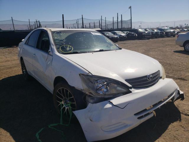 Photo 9 from auction – 2004 TOYOTA CAMRY LE with VIN 4T1BE32K04U364875