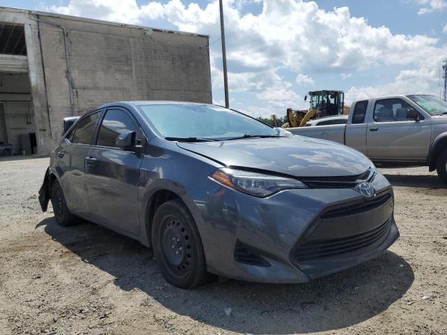 TOYOTA COROLLA L 2018 with VIN 5YFBURHE7JP744042 - Photo from auction