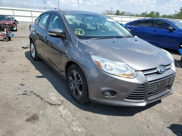 FORD FOCUS SE 2014 with VIN 1FADP3F27EL409406 - Photo from auction