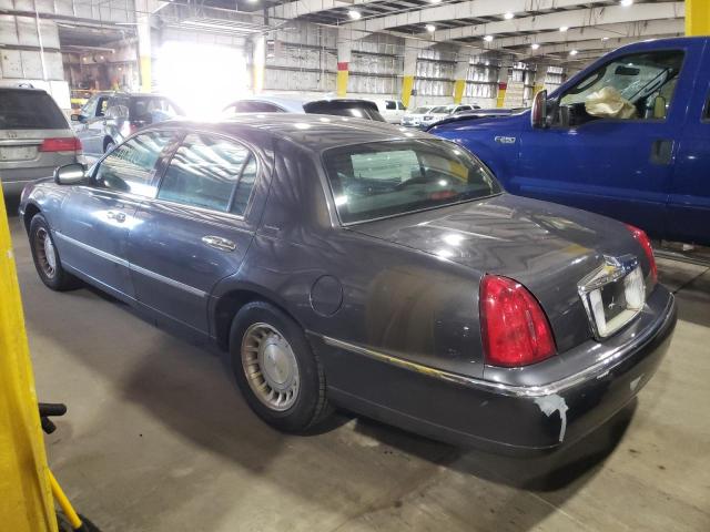 Фото 3 с аукциона – 2000 LINCOLN TOWN CAR E с VIN 1LNHM81W2YY852836