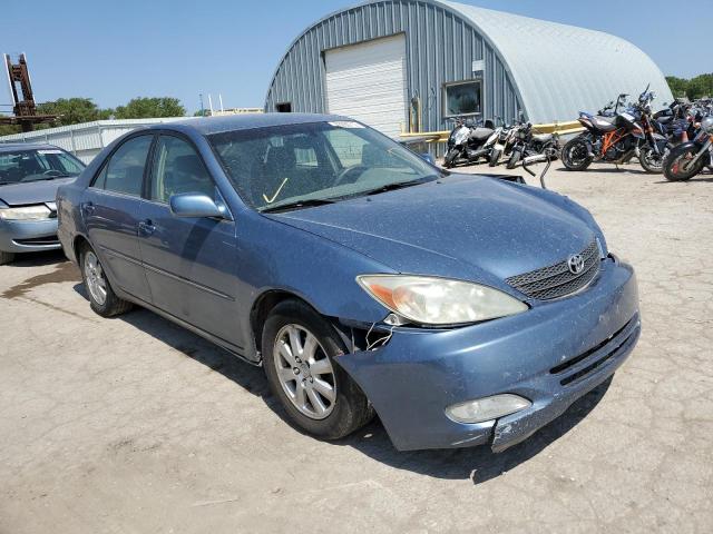 TOYOTA CAMRY LE 2003 with VIN JTDBE32K230171640 - Photo from auction
