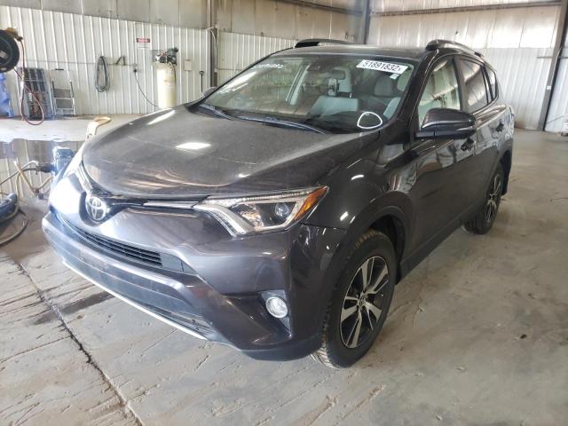 Photo 2 from auction – 2017 TOYOTA RAV4 XLE with VIN JTMRFREV8HJ128930