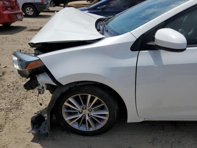 Photo 9 from auction – 2014 TOYOTA COROLLA L with VIN 5YFBURHE8EP137329