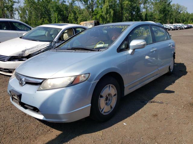 Photo 2 from auction – 2006 HONDA CIVIC HYBR with VIN JHMFA36276S003474