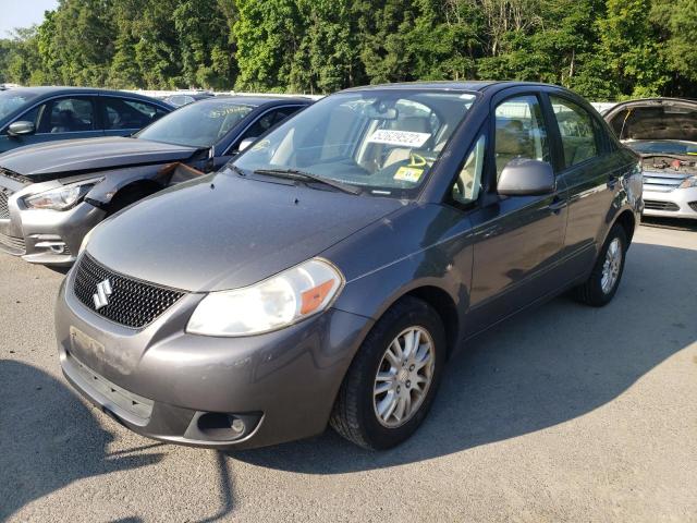 Photo 2 from auction – 2012 SUZUKI SX4 LE with VIN JS2YC5A30C6300158