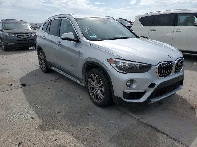 BMW X1 XDRIVE2 2017 with VIN WBXHT3C3XH5F77074 - Photo from auction