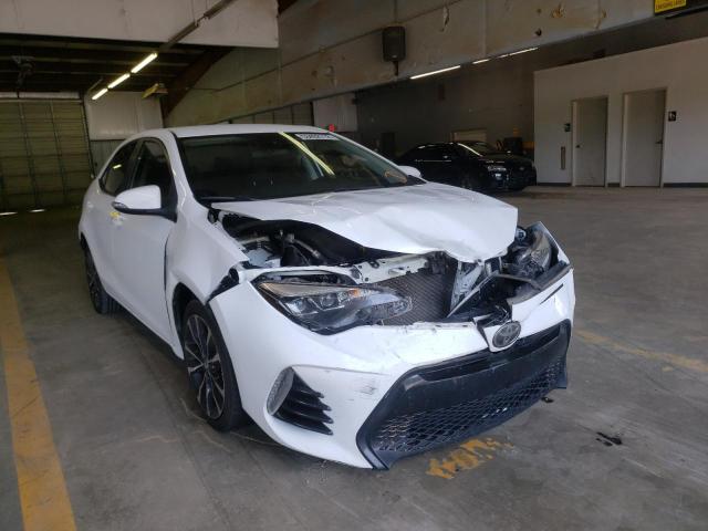 TOYOTA COROLLA L 2017 with VIN 2T1BURHE8HC831779 - Photo from auction