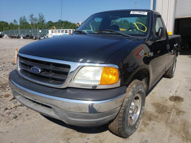 Photo 2 from auction – 2004 FORD F-150 HERI with VIN 2FTRF18214CA73409