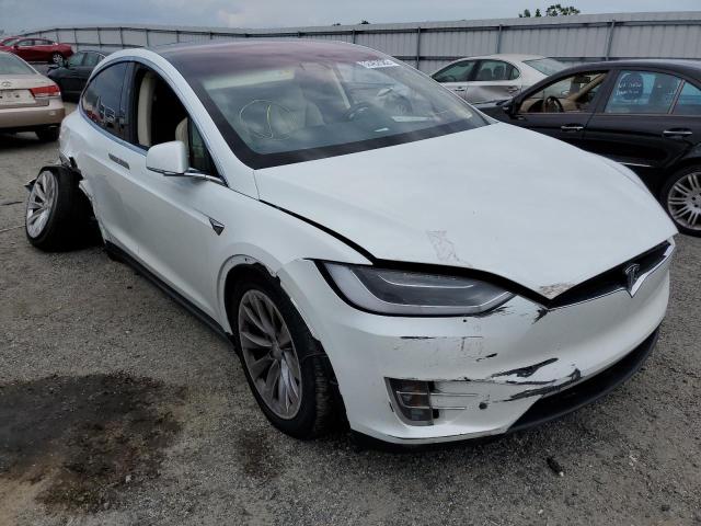 TESLA MODEL X 2018 with VIN 5YJXCDE28JF086930 - Photo from auction