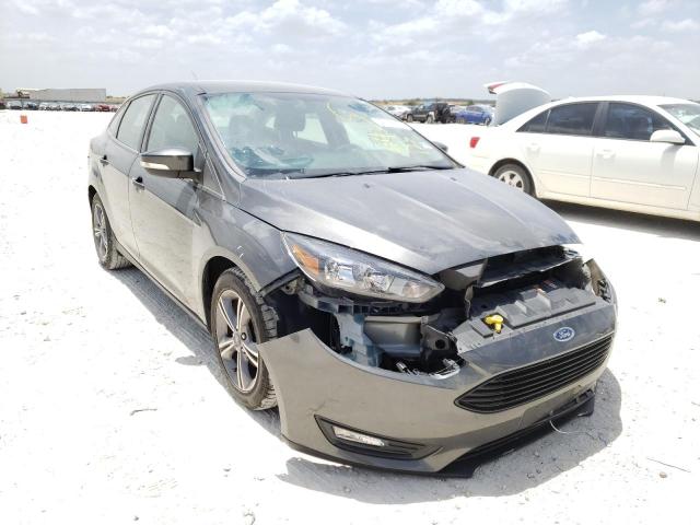 FORD FOCUS SE 2017 with VIN 1FADP3FE8HL314125 - Photo from auction