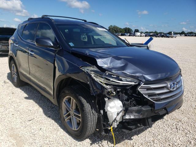 HYUNDAI SANTA FE S 2017 with VIN 5NMZU3LB4HH023934 - Photo from auction