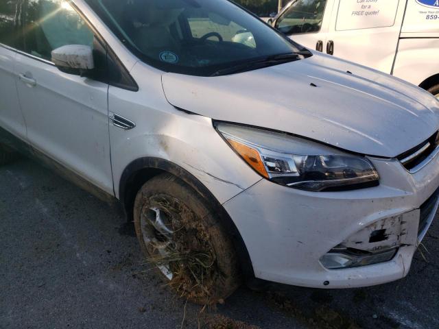 Photo 9 from auction – 2014 FORD ESCAPE TIT with VIN 1FMCU0J91EUC65262