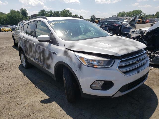 FORD ESCAPE SE 2018 with VIN 1FMCU9GD1JUB75863 - Photo from auction