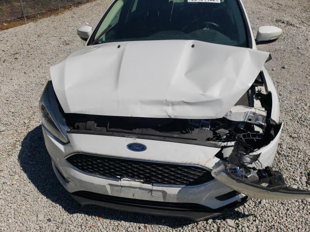 Photo 9 from auction – 2016 FORD FOCUS SE with VIN 1FADP3K21GL352175