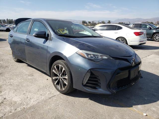 TOYOTA COROLLA L 2018 with VIN 2T1BURHEXJC098141 - Photo from auction