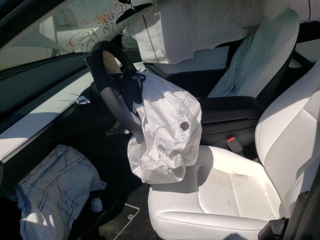 Photo 5 from auction – 2022 TESLA MODEL Y with VIN 7SAYGDEF5NF381925