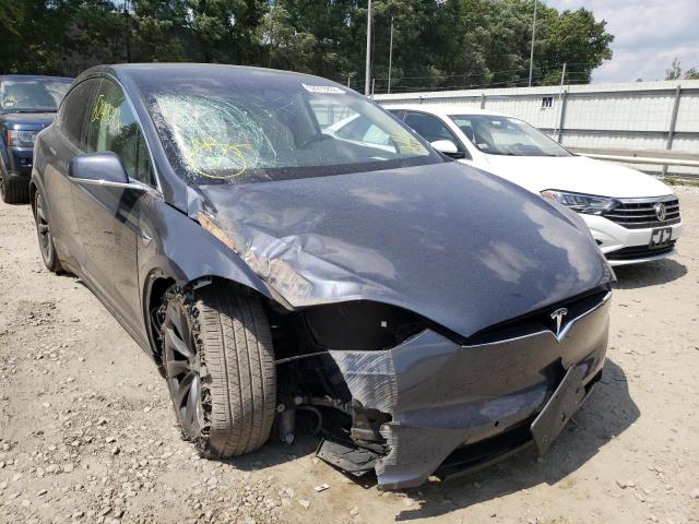 TESLA MODEL X 2018 with VIN 5YJXCAE2XJF140081 - Photo from auction