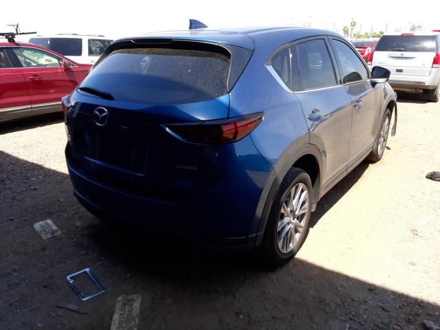 Photo 4 from auction – 2021 MAZDA CX-5 GRAND with VIN JM3KFBDM8M1372984