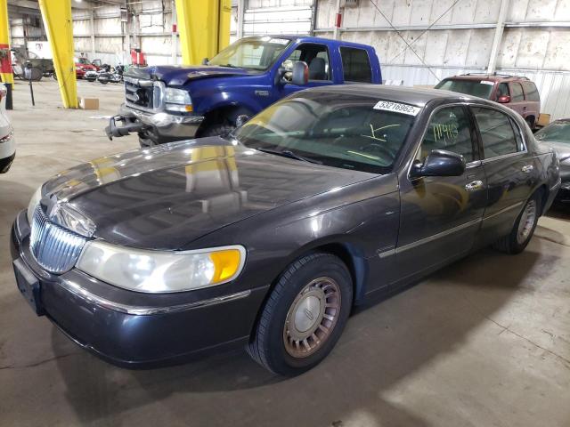 Photo 2 from auction – 2000 LINCOLN TOWN CAR E with VIN 1LNHM81W2YY852836