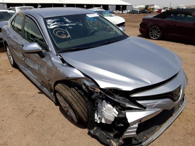 TOYOTA CAMRY LE 2020 with VIN 4T1C11AK3LU883147 - Photo from auction