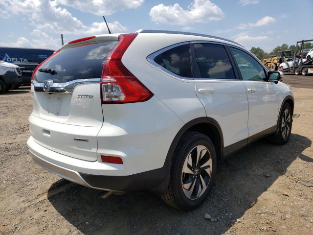 Photo 4 from auction – 2015 HONDA CR-V TOURI with VIN 5J6RM4H97FL056301