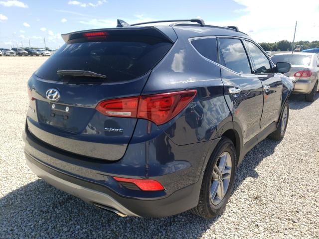 Photo 4 from auction – 2017 HYUNDAI SANTA FE S with VIN 5NMZU3LB4HH023934
