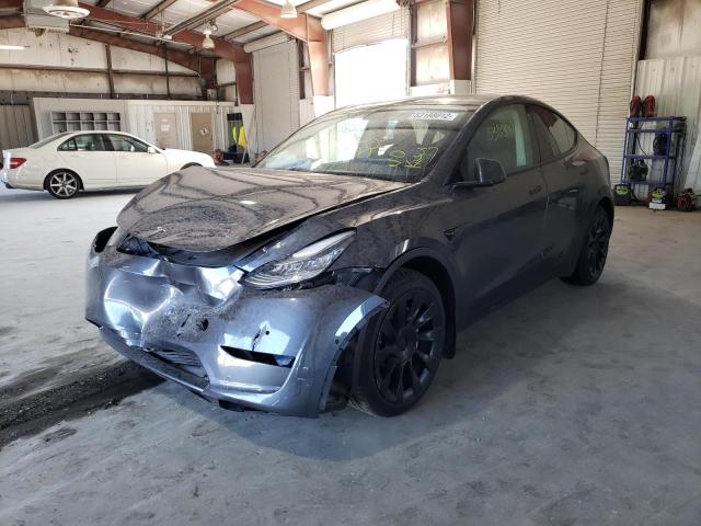 Photo 2 from auction – 2021 TESLA MODEL Y with VIN 5YJYGAEE9MF143254