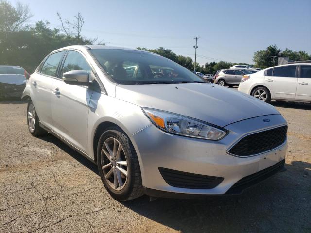 FORD FOCUS SE 2015 with VIN 1FADP3F24FL217040 - Photo from auction
