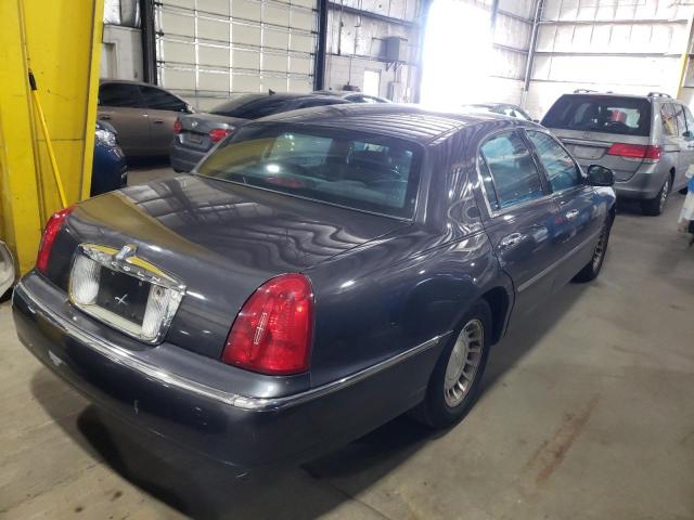 Photo 4 from auction – 2000 LINCOLN TOWN CAR E with VIN 1LNHM81W2YY852836
