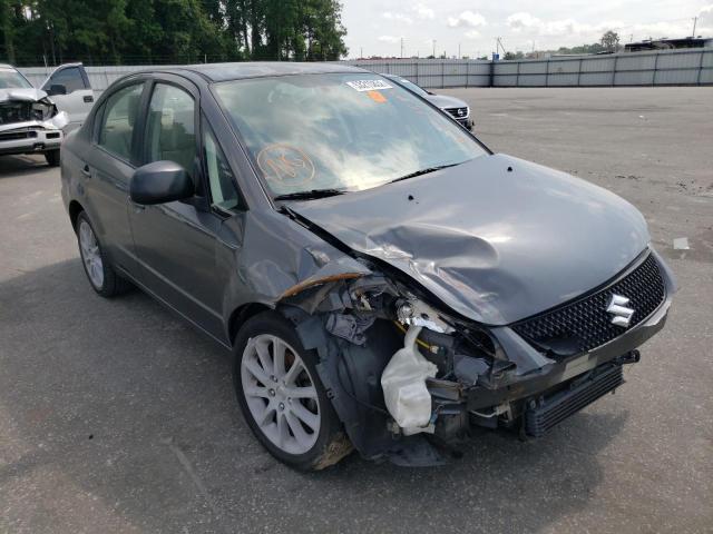 SUZUKI SX4 LE 2011 with VIN JS2YC5A24B6303621 - Photo from auction