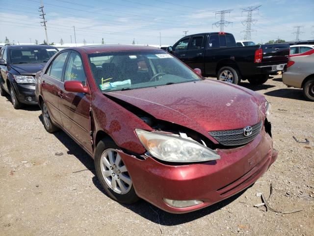TOYOTA CAMRY LE 2003 with VIN 4T1BF30KX3U040122 - Photo from auction