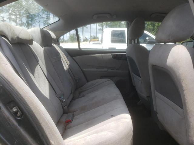 Photo 6 from auction – 2009 KIA OPTIMA LX with VIN KNAGE228995327105