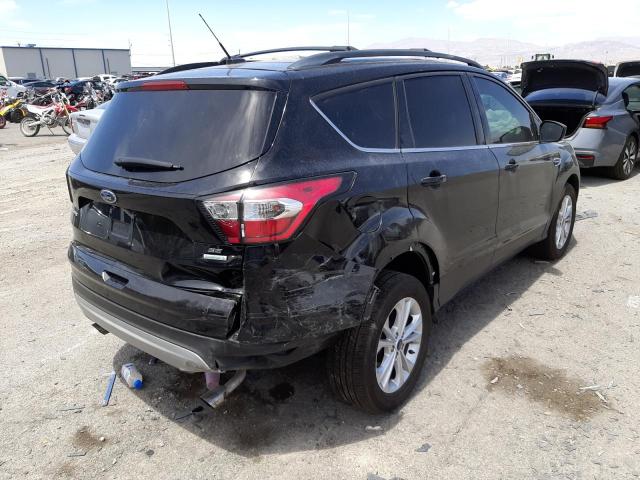 Photo 4 from auction – 2017 FORD ESCAPE SE with VIN 1FMCU0G98HUE97031