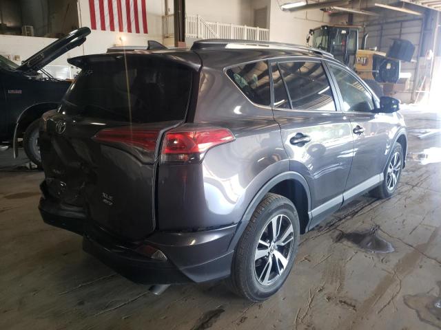 Photo 4 from auction – 2017 TOYOTA RAV4 XLE with VIN JTMRFREV8HJ128930