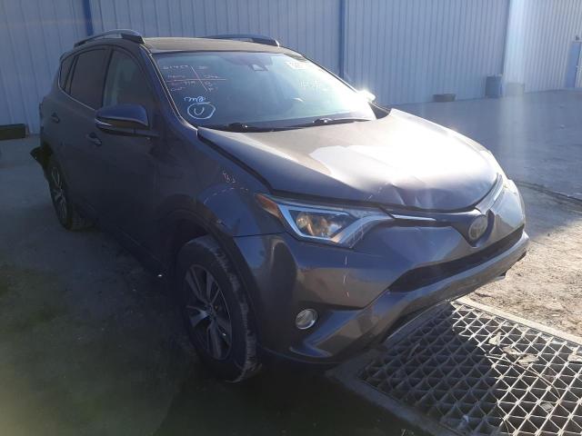 TOYOTA RAV4 XLE 2017 with VIN 2T3WFREV4HW317997 - Photo from auction