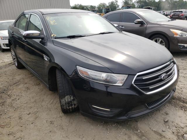 FORD TAURUS LIM 2014 with VIN 1FAHP2F84EG120928 - Photo from auction