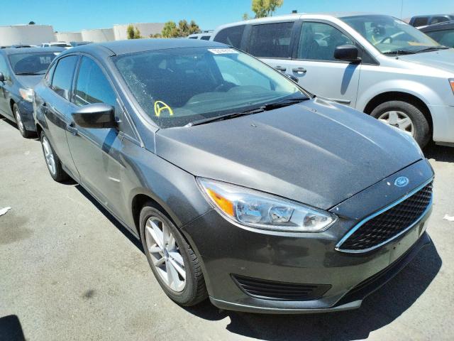 FORD FOCUS SE 2018 with VIN 1FADP3F20JL295078 - Photo from auction