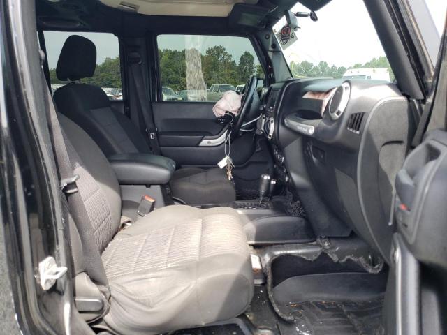 Photo 5 from auction – 2011 JEEP WRANGLER U with VIN 1J4BA6H19BL571309