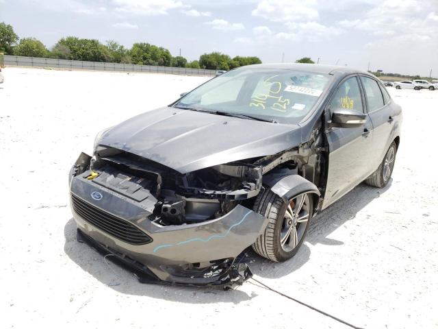 Photo 2 from auction – 2017 FORD FOCUS SE with VIN 1FADP3FE8HL314125