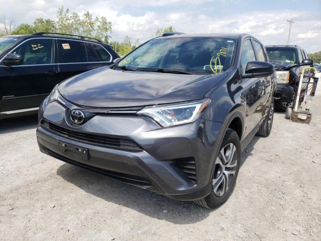 Photo 2 from auction – 2018 TOYOTA RAV4 LE with VIN JTMBFREV8JJ200085